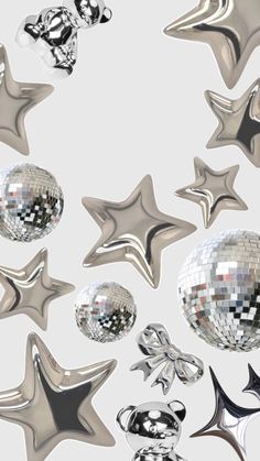 silver stars and disco balls are flying in the air