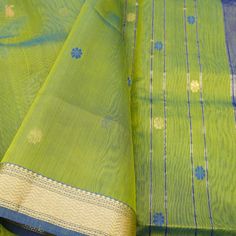 Khinkhwab brings you Maheshwari Sarees. Maheshwari handlooms owe their name to Maharani Ahilyabai Holkar, the ruler of the state of Indore in the late 18th century. Her reign was deemed the Golden Age, and she is revered by all at Maheshwar as Devi Ahilyabai or Ma Saab till date. Maheshwari handlooms derived their fine simplicity from this icon. It is said that under her artistic guidance, the craftspeople made light fabrics, detailed with motifs derived from carvings on the Maheshwar fort- a de Green Traditional Wear With Weaving Work For Puja, Green Traditional Wear With Weaving Work For Festivals, Traditional Festive Wear For Diwali, Green Traditional Wear With Weaving For Navratri, Green Chanderi Traditional Wear With Weaving Work, Traditional Green Handloom Dupatta, Green Chanderi Dupatta With Weaving Work, Green Dupatta With Weaving Work For Traditional Ceremonies, Ahilyabai Holkar