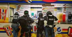 police officers standing in front of a fast food stand