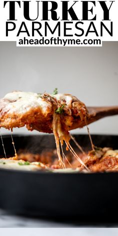 chicken parmesan being lifted from a skillet with text overlay that reads how to make turkey parmesan