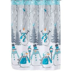 a shower curtain with snowmen and trees on it