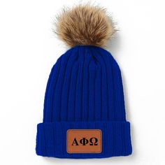 Represent in style with our Sorority Pom Pom Beanie Hat! Our knit hat is color specific to your organization and features a vegan leather patch embossed with your sorority letters. The super fluffy fur pom pom on top makes it the perfect trendy accessory to show off your spirit during the fall and winter months! Theta Phi Alpha, Phi Sigma Sigma, Sorority Letters, Pom Pom Beanie Hat, Alpha Xi Delta, Alpha Xi, Sorority Outfits, Coloring Stickers, Skull Cap Beanie