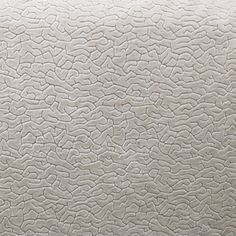 an upholstered mattress is shown with no sheets