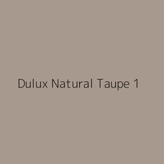 the words dulux natural taupe 1 are in black and white on a gray background