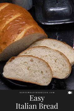 sliced bread on a black plate with the words easy italian bread in front of it