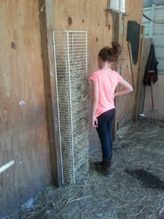 DIY hay feeder.Turned an old shelf into a hay feeder for goats and mini horses Hay Feeder For Goats, Goat Hay Feeder, Goat Playground, Goat Toys, Goat Shed