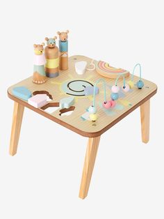 a wooden table with toys on it