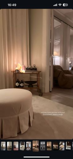 an image of a bedroom with candles on the bed and in the background is a couch