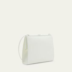 Saint Laurent "Le-Anne Marie" shoulder bag in glossy faux leather (polyurethane) Adjustable shoulder strap  Framed top with lift-clasp closure  Interior, one slip pocket  Approx. 8.5"H x 7.1"W x 2.5"D Professional cleaning recommended Made in Italy Modern Formal Shoulder Bag With Fold Over Clasp, White Crossbody Evening Bag For Formal Occasions, White Crossbody Evening Bag For Formal Events, White Rectangular Shoulder Bag With Magnetic Closure, White Rectangular Shoulder Bag With Fold Over Clasp, White Leather Shoulder Bag With Fold Over Clasp, White Rectangular Bag With Fold Over Clasp, White Leather Evening Bag With Detachable Strap, White Shoulder Bag With Fold Over Clasp For Evening