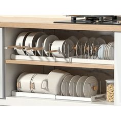 an open cabinet with plates and cups in it