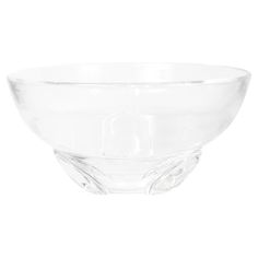 a clear glass bowl sitting on top of a white table