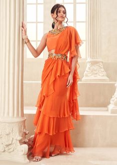 Orange Pre-Draped Sari Set by Taavare available on Indiaspopup.com Tiered Saree, Pageant Wardrobe, Floral Work Blouse, Floral Cutwork, Indian Fits, Saree Gowns, Sleeveless Blouse Designs, Elegant Sarees, Saree Drape