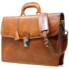 "Since 2003 Floto leather bags have been produced by hand using old world craft methods and modern technology. This leather briefcase was artisan made in Tuscany, Italy. The Leather: At Floto, we work with different kinds of leather to make our leather briefcase and bag collections. Every briefcase is made with 100% genuine leather. We prefer vegetable tanned leather because it is strong, flexible, and has deep, rich color tones without any harsh chemicals. This particular bag is made with a han Classic Brown Laptop Case, Brown Rectangular Business Case Bag, Light Brown Shoulder Bag For Business, Formal Light Brown Rectangular Satchel, Classic Light Brown Bag For Formal Occasions, Classic Brown Rectangular Briefcase, Classic Brown Vegetable Tanned Leather Bags, Classic Light Brown Business Satchel, Classic Brown Office Cases