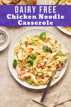 chicken noodle casserole with broccoli and carrots on the side