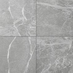 four different angles of marble tiles with white lines on them, all in shades of grey