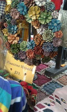 there is a wreath made out of fake succulents