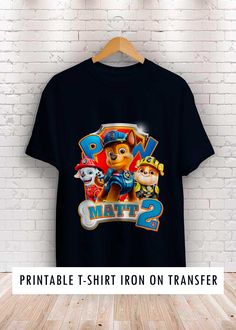 a black shirt with paw patrol on it and the words, printable t - shirt iron