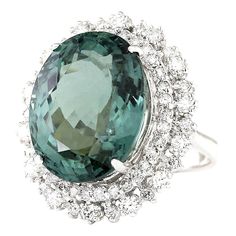 Stamped: 14K White Gold Total Ring Weight: 11.3 Grams Ring Length: N/ARing Width: N/A Gemstone Weight: Total Natural Tourmaline Weight is 17.90 Carat (Measures: 18.30x14.55 mm) Color: Green Diamond Weight: Total Natural Diamond Weight is 2.00 Carat Quantity: 62 Color: F-G, Clarity: VS2-SI1 Face Measures: 26.10x22.50 mm Sku: [703621W] Unique Silver Tourmaline Gemstones, Indicolite Tourmaline Ring, Green Tanzanite Multi-stone Jewelry, Polished Green Tourmaline Jewelry, Green Tsavorite Multi-stone Jewelry, 14k White Gold Diamond Ring, Green Diamond, White Gold Diamond Rings, Green Tourmaline