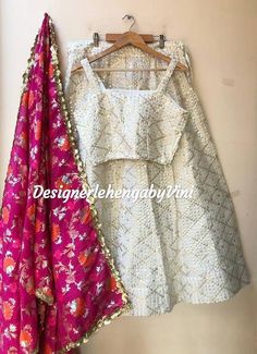 All size available from S to 5XLFabric details-Top & lehenga- Georgette baseDupatta- Banarasee silkBlouse design can be customized.Length of lehenga can be customized (standard length- 41 inches). White Dola Silk Lehenga For Festivals, White Art Silk Lehenga With Sheer Dupatta, White Art Silk Lehenga With Dupatta, Designer White Lehenga With Self Design, White Anarkali Lehenga With Self Design, White Bollywood Lehenga With Self Design, Festive White Self-design Lehenga, White Self-design Dupatta For Reception, White Raw Silk Lehenga With Unstitched Blouse