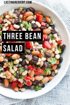 three bean salad in a white bowl with the title above it