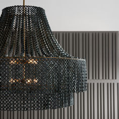 a black chandelier hanging from a ceiling