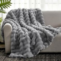 a couch with a blanket on top of it