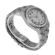 Description Guaranteed Authentic Lady's Rolex Masterpiece with a 34mm 18K white gold case. This fine timepiece features a custom G/VS2 quality brilliant-cut diamond-paved dial with Roman Numerals, a custom G/VS2 quality brilliant-cut diamond bezel, and a 18K White Gold bracelet with custom G/VS2 quality brilliant-cut diamonds. This watch is in excellent condition. It comes with a One Year Warranty from Da Vinci Fine Jewelry, Inc., a gift box and certified retail appraisal from Da Vinci Fine Jewe Classic Iced Out Round Diamond Watch, Luxury White Gold Jewelry And Watches With Vvs Clarity, Diamond White Watches With Diamond Accents, Luxury Diamond Watch With Pave Setting For Anniversary, Luxury Cubic Zirconia Watch For Anniversary, Timeless Iced Out Diamond Jewelry, Luxury Cubic Zirconia Jewelry And Watches For Anniversary, Diamond Watch With Brilliant Cut, Luxury Iced Out Jewelry And Watches For Anniversary