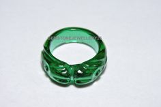 Buyers will receive 1 piece dark green quartz carved ring band / gemstone made ring band. This item is so beautiful and eye catching. you will really love it. Product - Dark Green Quartz Carved Ring Band Gemstone - Quartz Quantity - 1 Piece Lab Created Gemstone Note - Please choose your ring size from the variation drop down menu. If you want our product in more quantity then please feel free to contact us we can make you provide as much as quantity as you want as we have our own manufacturing u Green Carved Rings Perfect For Gifts, Green Carved Rings For Anniversary, Green Carved Jewelry For Anniversary, Carved Green Round Jewelry, Green Carved Round Jewelry, Luxury Green Carved Jewelry, Green Intaglio Ring Jewelry, Carved Jade Rings For A Gift, Handmade Green Jade Rings