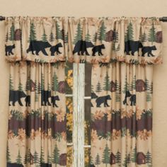 a window curtain with bears and sunflowers on it in front of a beige wall