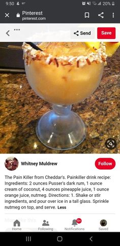 an image of a drink in a glass on top of a counter with the caption'whiskey mudrew '