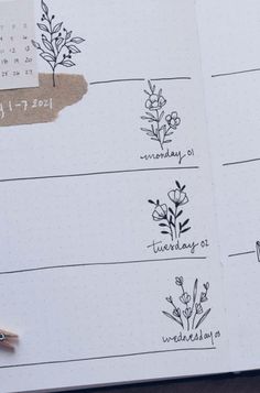 an open planner with plants drawn on it