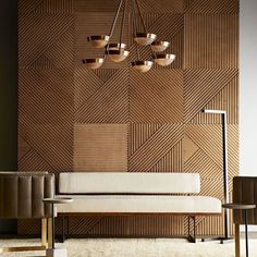 a modern living room with wood paneling and chandelier hanging from the ceiling