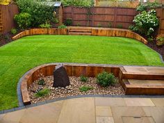 a backyard with grass and wooden steps