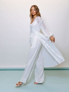 Maxi length cover-up Long sleeve Sheer fabric Tie at waist for closure Fabric: Sequin Mesh HPS: 51" Dry clean only Dry Clean Only, White Maxi, Sheer Fabric, Sheer Fabrics, Individual Style, Body Measurements, Sequin, Cover Up, Dry Clean