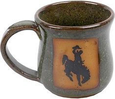 Western Bronc Coffee Cup in Sea Mist Green - Your Western Decor Western Cups, Western Pottery, Cowboy Coffee, Bucking Bronco, Lake Havasu City, The Blue Mountains, Western Decor, Blue Mountain, Microwave Oven