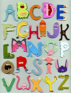 the letters and numbers are made up of different types of paper animals, monsters, and birds