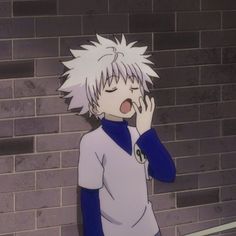 an anime character standing in front of a brick wall with his hands to his face