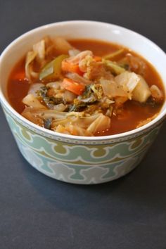 a bowl of vegetable soup on a table