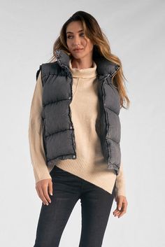 Embrace comfort and style with the Jemma Distressed Puffer Vest. Crafted from distressed denim, this zip-up puffer vest boasts a jumbo collar for a standout look. The pockets add a touch of functionality, making it a stylish choice for both layering and making a statement on its own. Stay warm while staying on-trend with the Jemma Puffer Vest, a versatile addition to your wardrobe. Puffer Vest, Denim Wash, Womens Vest, Zip Up, Distressed Denim, Stay Warm, Puffer, Layering, Zip Ups