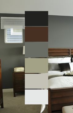 a bed room with a neatly made bed and several different shades of paint on the walls