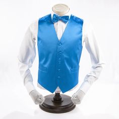 Rich color adds a stylish edge to this attractive vest featuring crisp satin microfiber and an easily adjustable strap for versatility. Blue Vest Outfit Men, Vest Outfits Men Casual, Blue Vest Outfit, Light Blue Vest, Vest Outfits Men, Purple Vest, Purple Vests, Blue Vest, Blue Vests