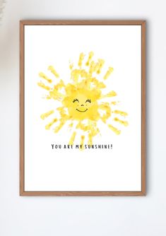 a yellow sun print with the words you are my sunshine written in black on it