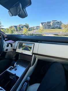 the interior of a car with an electronic dashboard