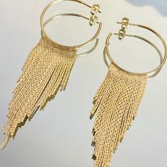 Item Description: - Hoop Fringe Total Length: 80mm Hoop Width: 29mm Fringe Width; 19mm FAST & FREE SHIPPING!! Our handmade products are rated very high by our customers. We work hard with our Quality Control department to ensure the quality you deserve. -New! -Very good quality. Looks even better in person. -This is a product for women -Shop Related Items: https://www.etsy.com/listing/1206523307/gold-fringe-earrings-hoop-fringe?click_key=7a25301203832c1e814288261e7b7d98f5b08194%3A1206523307&clic Metal Fringe Dangle Earrings, Fringe Dangle Metal Earrings, Elegant Hoop Earrings With Latkans, Yellow Gold Tassel Dangle Earrings, Yellow Gold Dangle Earrings With Tassels, Gold Fringe Chandelier Earrings As Gift, Yellow Gold Dangle Hoop Earrings, Long Dangle Earrings Gold, Gold Tassel Earrings