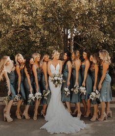 a group of women standing next to each other