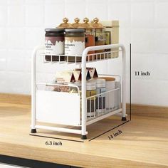 a kitchen shelf with spice and condiments on it