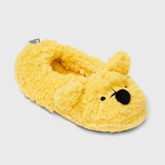 Lounge the way you like in the Women's Disney Winnie the Pooh Slippers in Yellow. With a lightweight design, these slippers are easy to wear and won't weigh you down as you move around in your space. The insole is made of soft and cozy polyester material, providing ultimate comfort for your feet. The added polyester lining further ensures a snug fit. The closed-toe design keeps your feet warm with a flexible outsole that's designed for extra freedom of movement all day. Fun Synthetic Slippers For Indoor Use, Fun Synthetic Indoor Slippers, Fun Indoor Synthetic Slippers, Playful Indoor Synthetic Slippers, Winnie The Pooh Shoes, Yellow Slippers, Comfy Slippers, Disney Food Blog, Disney Ladies