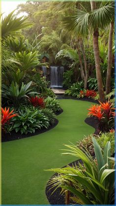 a lush green garden with lots of trees and plants in the center, along with a waterfall