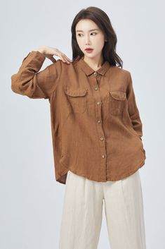 "Introducing our stunning brown linen long-sleeve shirt, crafted from high-quality, breathable linen fabric. The versatile brown color is a timeless classic, pairing well with any outfit. The relaxed fit makes it comfortable and easy to wear, whether dressed up or down. Perfect for any season, this shirt is sure to become a staple in your wardrobe. Details: * 100% linen * Casual Linen shirt, Plus size Linen shirt * long sleeves Linen shirt * Plus size Linen top * Oversize Linen blouse * Fashiona Cheap Brown Cotton Blouse, Brown Long Sleeve Shirt With Buttons, Brown Solid Color Tops For Work, Collared Linen Blouse For Fall, Long Sleeve Cotton Blouse In Brown, Brown Cotton Long Sleeve Blouse, Long Sleeve Brown Cotton Blouse, Brown Long Sleeve Cotton Blouse, Brown Long Sleeve Tops With Pockets