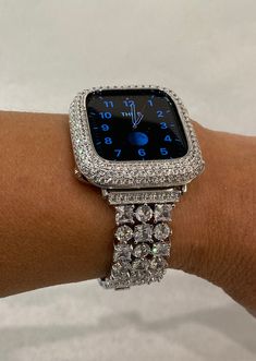 Fits the Apple Watch available for sizes 38mm 40mm 41mm 42mm 44mm 45mm 49mm Ultra 1 or 2 Series 2-9 & SE Men's & Women's. This is a custom design made to fit the Apple Watch, it is not a brand copy. Iwatch Band with Large High Quality Princess and Round High End Swarovski Crystals. Luxury Band and Bezel, purchase the band only or set. Silver Plated Metal Band loaded with High End Crystals. Iwatch Candy for your Apple Watch Wrist size fits 5.75 inch to 7.25 inch, changing size only click and unfo Apple Watch Cover, Custom Apple Watch Bands, Diamond Grillz, Mens Bling, Apple Watch Bands Fashion, Bling Things, Apple Watch Bands Women, Apple Watch Fashion, Apple Watch Sizes